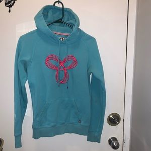 TNA Blue Hoodie with Pink Design